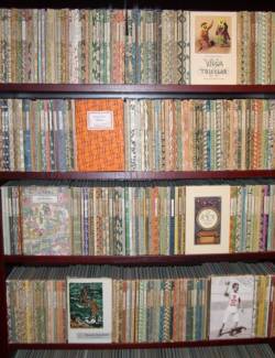 book shelf with books by publishing company "Insel"